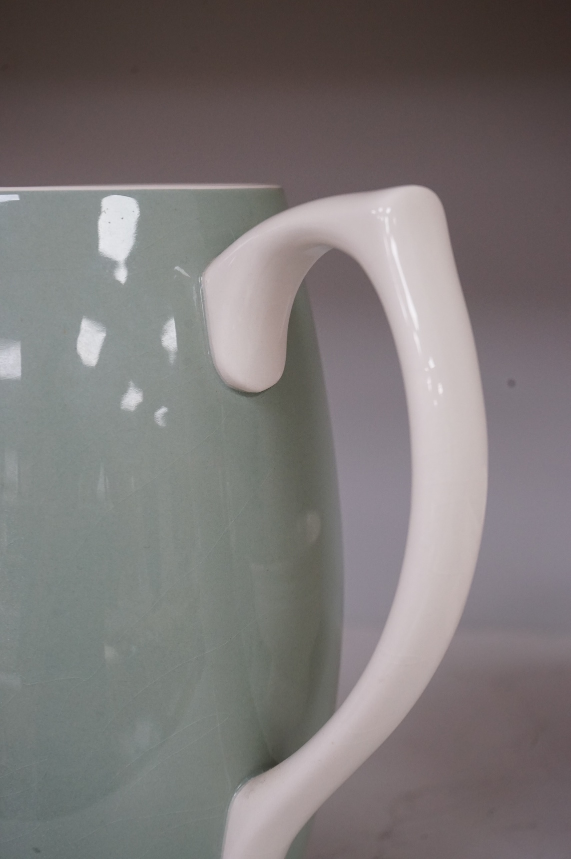 Keith Murray for Wedgwood, a green jug, 20.5cm high